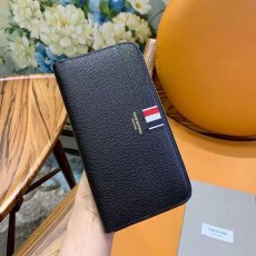 톰브라운 페블레더 지퍼 장지갑 FAW012A 00198001 21x12cm
